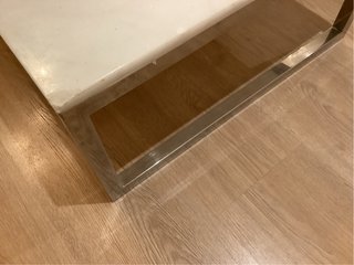 Mesa de centro mármol y acero pulido