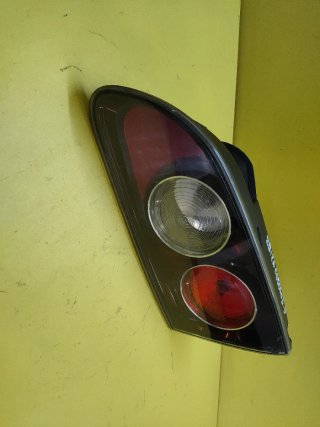 PILOTO TRASERO DERECHO SEAT IBIZA 6L PORTON OSCURO