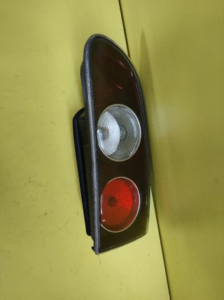 PILOTO TRASERO DERECHO SEAT IBIZA 6L PORTON OSCURO