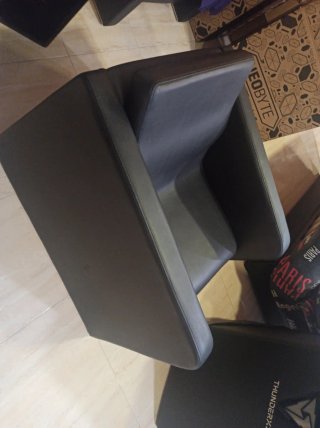 Sillón de peluquería negro,