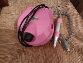 Torno de uñas profesional rosa y plateado