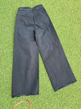 Pantalones anchos negros chica