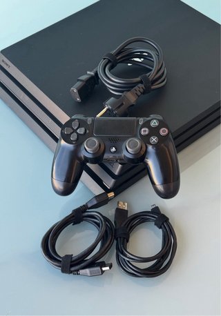 PS4 Pro + Juegos + Mando + cables