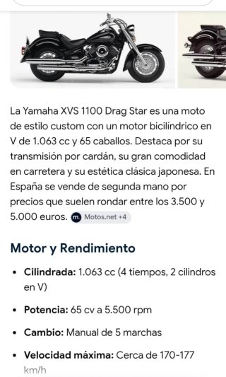 Yamaha Cruiser Negra, dorada. Reloj en el manillar