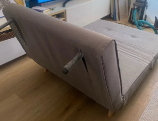 Sofá cama gris de tela