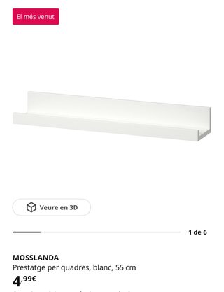 Dues estanteries paret blanques.
