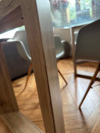 Mesa de comedor de cristal con estructura efecto m