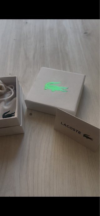 Pulsera Lacoste Dorada con Herramienta