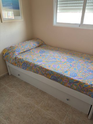 Dormitorio juvenil cama nido y armario