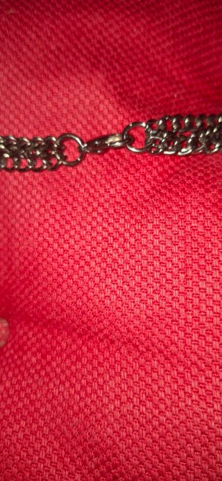 Collar cadena plateado con piedras naranjas
