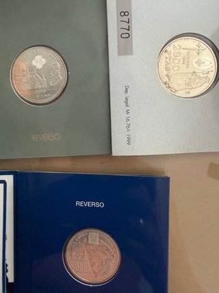 7 Monedas de 2000 pts en su cartera en Plata