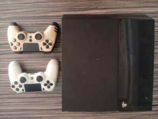 PS4 con 2 mandos 500go