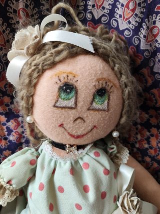 Muñeca antigua de tela