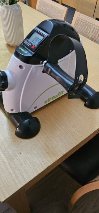 Bicicleta estática portátil para pies y brazos