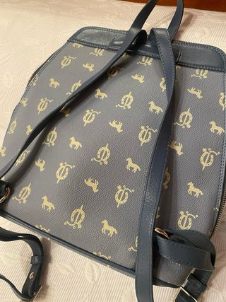 Mochila azul y dorada mujer