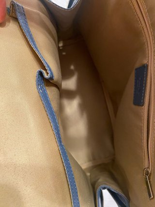 Mochila azul y dorada mujer