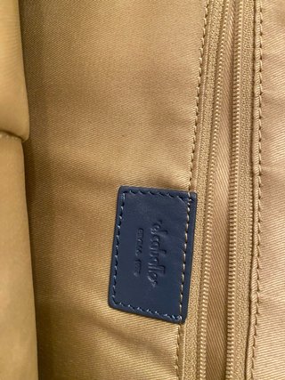 Mochila azul y dorada mujer