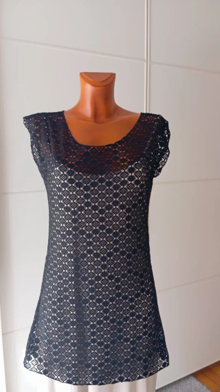 Vestido mini negro. Encaje. Transparente.