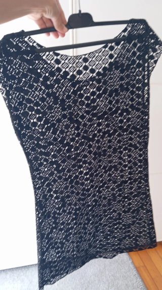 Vestido mini negro. Encaje. Transparente.