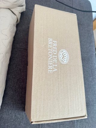 Sandalias doradas planas con tira