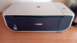 Impresora Canon Negra y Blanca