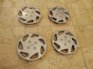 Tapacubos Nissan Almera Originales