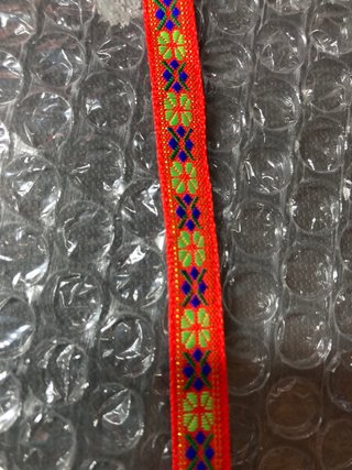Pulsera tejida multicolor
