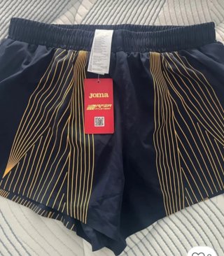Pantalón running Joma RFEA azul y dorado
