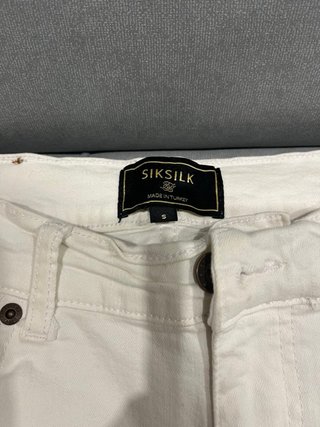 Bermudas Siksilk blancas desgastadas