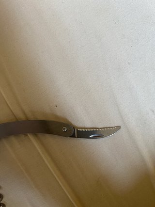 Sacacorchos y navaja multiusos
