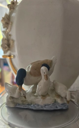 Figura vintage de porcelana patos