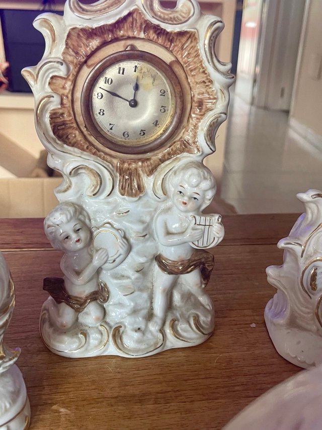 Lote 5 relojes vintage porcelana figuras