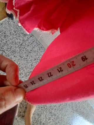 Traje de flamneca fucsia.
