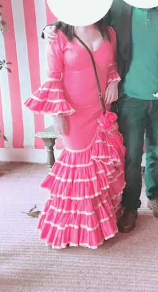 Traje de flamneca fucsia.