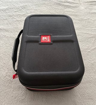 Nintendo Switch OLED neón + 2 fundas + accesorios