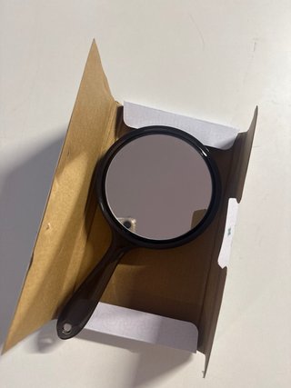 Specchio nero con manico