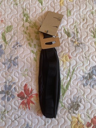Riñonera Nike running black (T. OS)