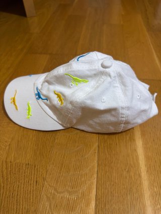 Gorra infantil dinosaurios blanca