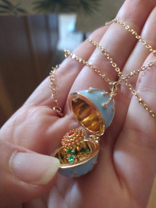 Collana uovo stile faberge apribile con fiorellino