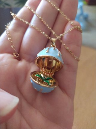 Collana uovo stile faberge apribile con fiorellino