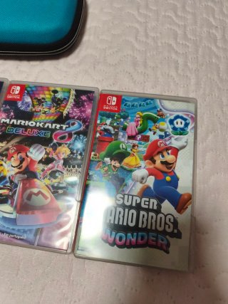 Nintendo Switch Lite + 5 Juegos