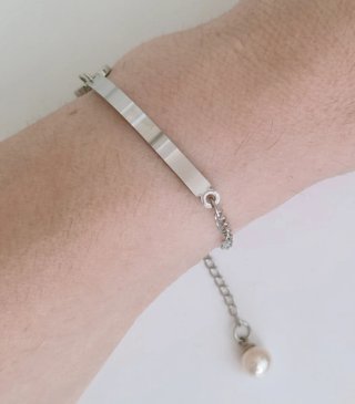 Pulsera acero perla.