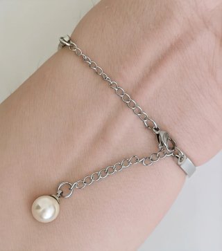 Pulsera acero perla.