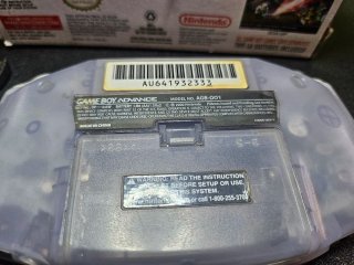 Game Boy Advance con caja y adaptador