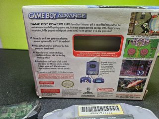 Game Boy Advance con caja y adaptador