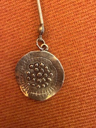 Collar étnico vintage con medallón