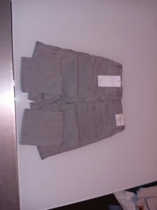 Pantalón Mango gris con etiqueta