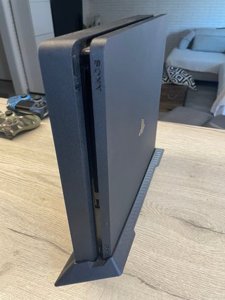 PS4 (PlayStation 4) con base y 2 mandos