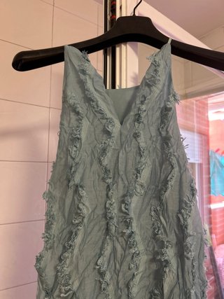 Vestido largo turquesa con flecos