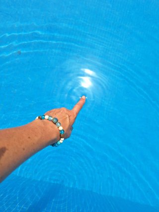 Pulsera artesanal azul y marrón